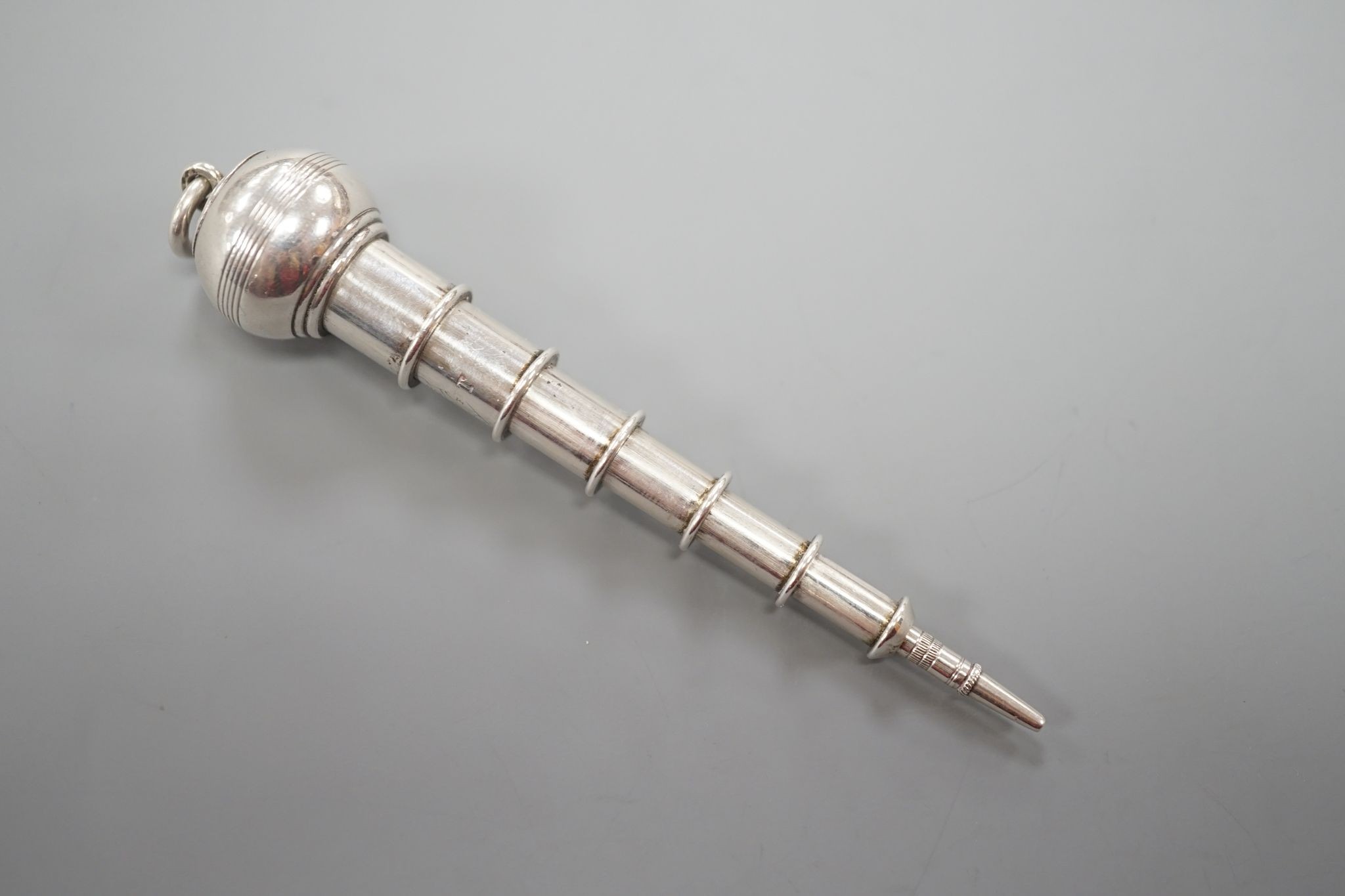 Sampson Mordan novelty plated telescopic pencil, in the form of a spinning top when closed, 9 cms long.